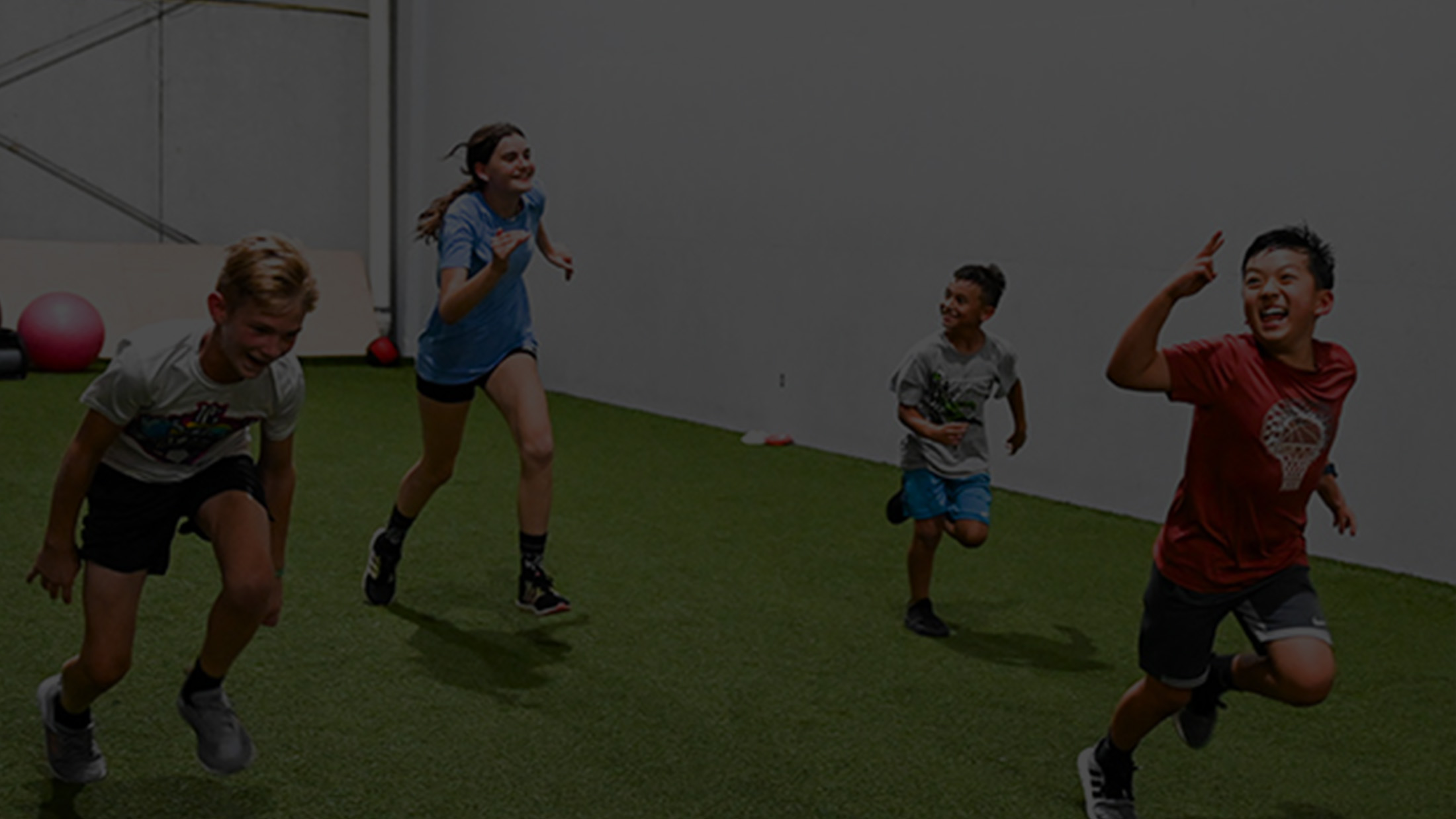 A group of kids doing a speed training workout and having fun.