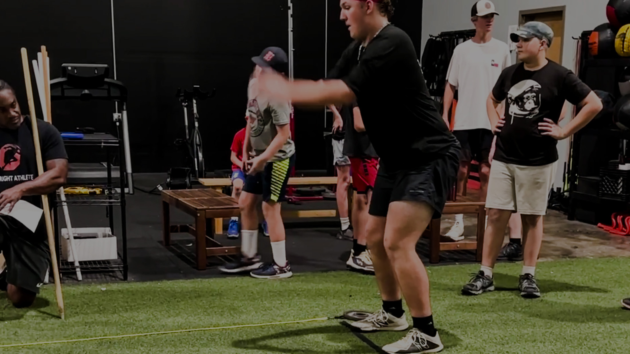 Baseball player about to jump.